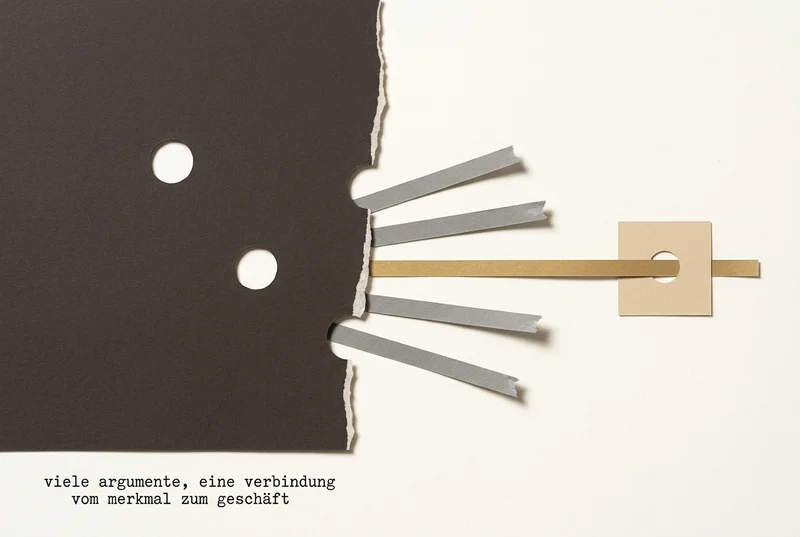 Cut-paper collage: a large, very dark sheet with punched holes, bounded on the right by a hand-torn edge. Five narrow paper strips run right across the pale ground; four grey ones end frayed in the open, the golden one alone carries on and through a hole in a small sand-coloured square. The caption is in German.