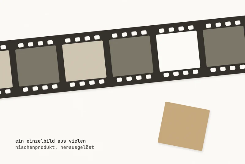 Paper-cut collage: a large filmstrip cut from dark paper runs slightly tilted across the frame and is cropped left and right. The perforation is punched out and the pale ground shows through. One window is missing its frame; the frame lies beside the strip, cut from gold paper. The caption is in German.
